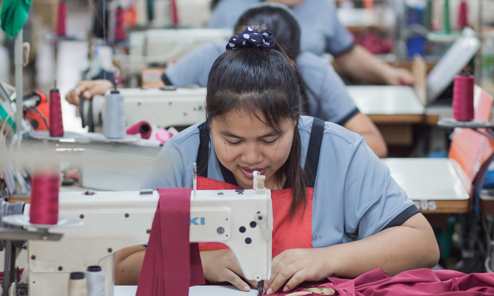 Corporate polo shirts being sewn in production